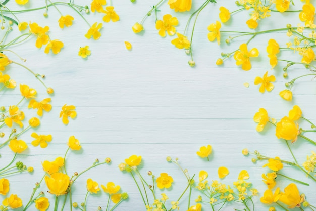 Summer flowers on green wooden