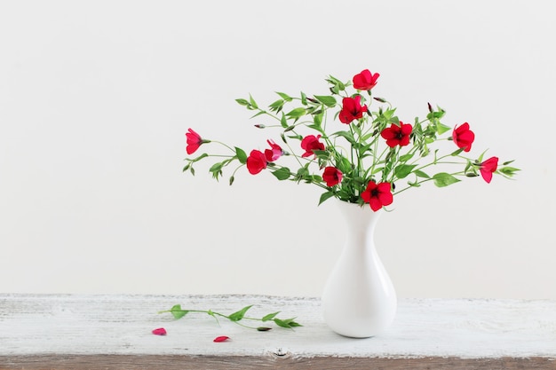 Summer flowers in white vase