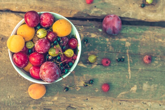 Summer fruit berries - gooseberries, cherry plums, barberry, raspberries, apricots. 