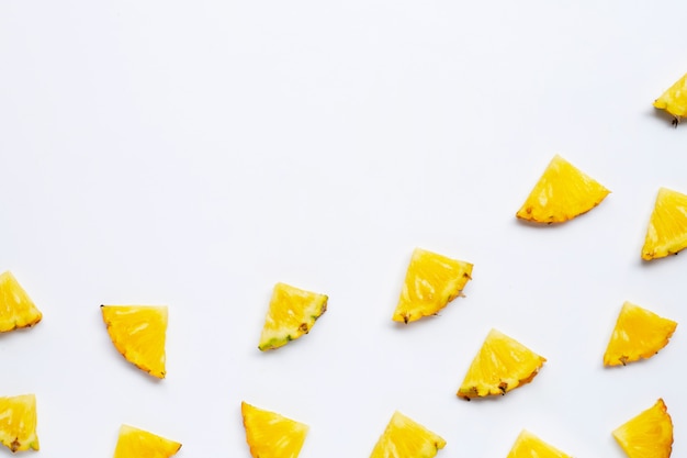 Summer fruit. Sliced pineapple on white background. Copy space