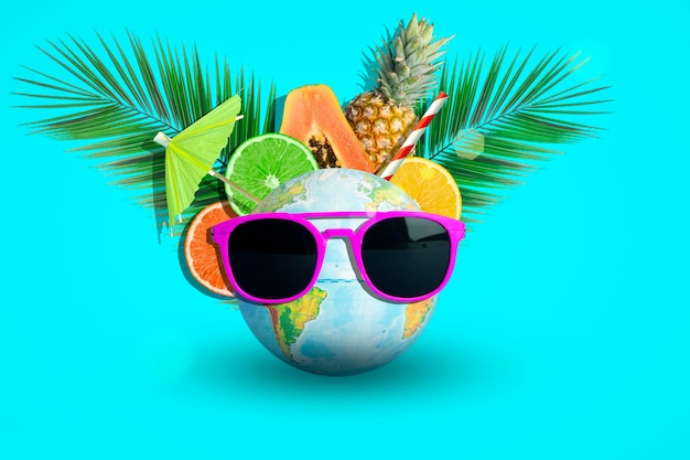 Summer fruits and travel vacation background Tropical juicy fruits pineapple citrus and palm branche