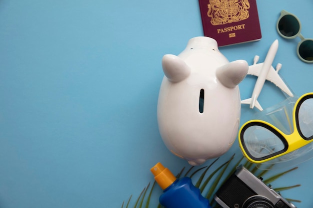 Photo summer holiday piggy bank background. saving up for a vacation.