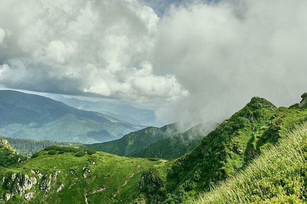 Summer landscape in carpathian mountains with cloudy sky. Carpathian, Ukraine, Europe.