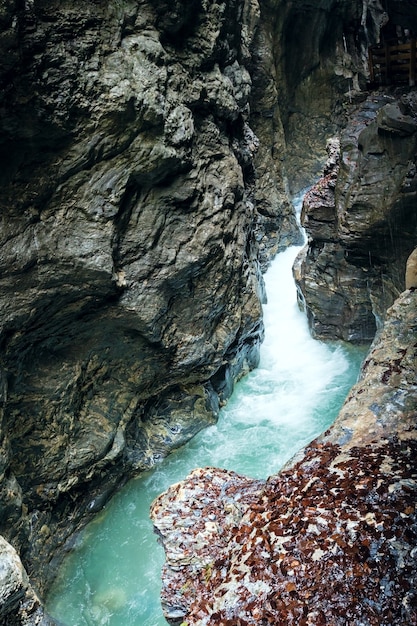 Summer Liechtensteinklamm gorge with stream and waterfalls in Austria.