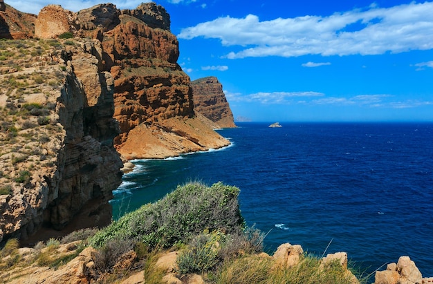 Summer Mediterranean sea rocky coast landscape near Benidorm city (Costa Blanca, Alicante, Spain).