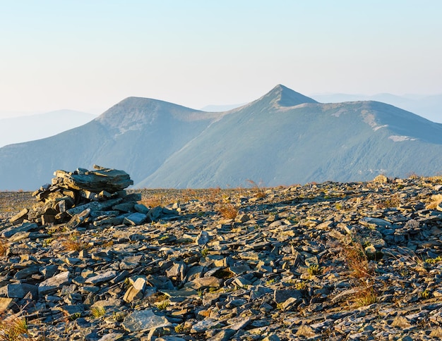 Summer morning Carpathian mountain top view from stony summit of Ihrovets Mount (Gorgany, Ukraine).