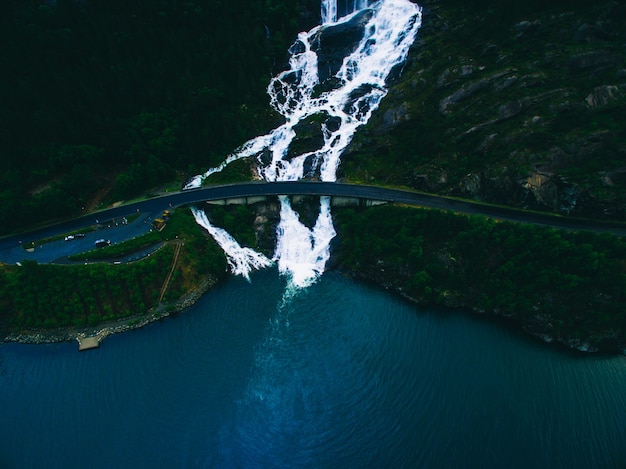 Summer mountain Langfoss waterfall on slope (Etne, Norway). Aerial drones photo