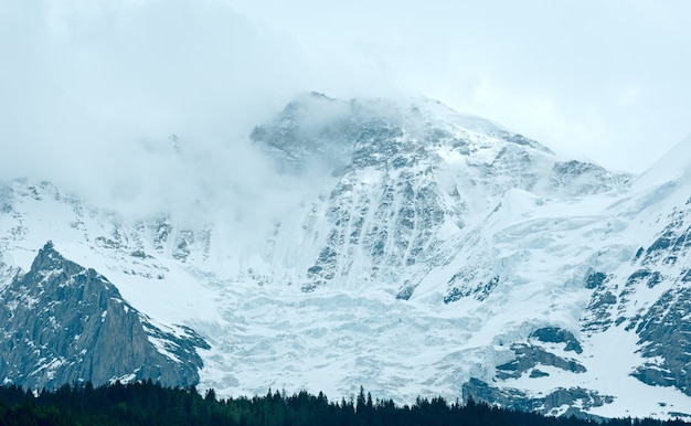 Summer mountain with snow on rock top (Switzerland)