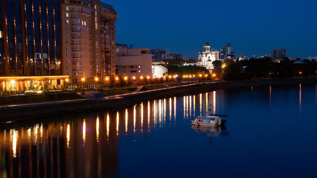 Summer night on the Iset river in the city center Yekaterinburg Russia