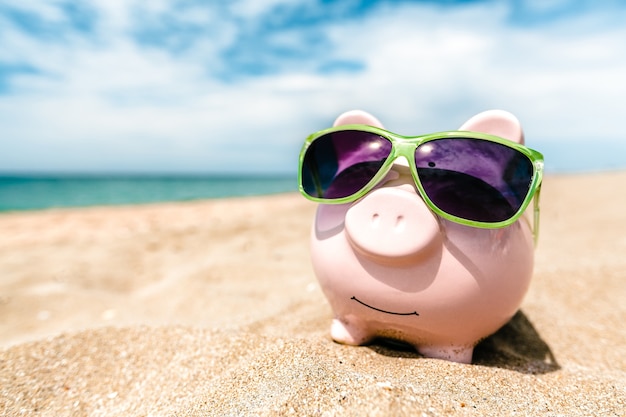 Summer piggy bank with sunglasses