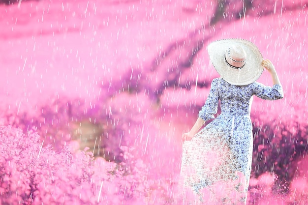 summer rain field girl flowers, beautiful young lady in spring field with flowers happiness freedom