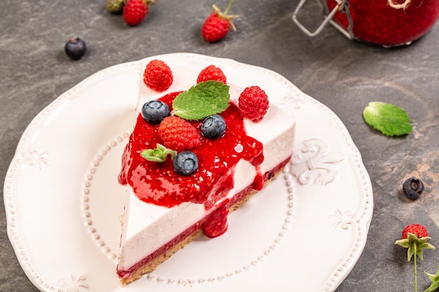 Summer raspberry and blueberry no bake cheesecake banner menu recipe place for text top view