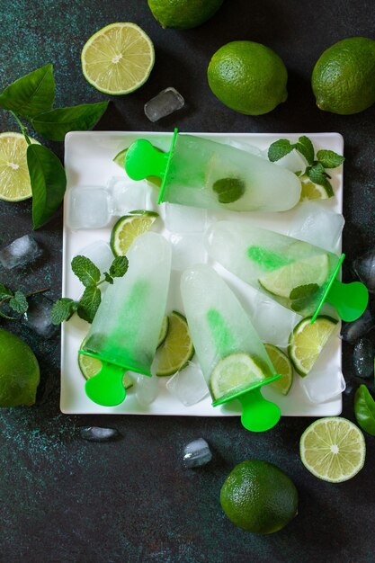 Summer refreshing homemademojito popsicles with lime juice Copy space