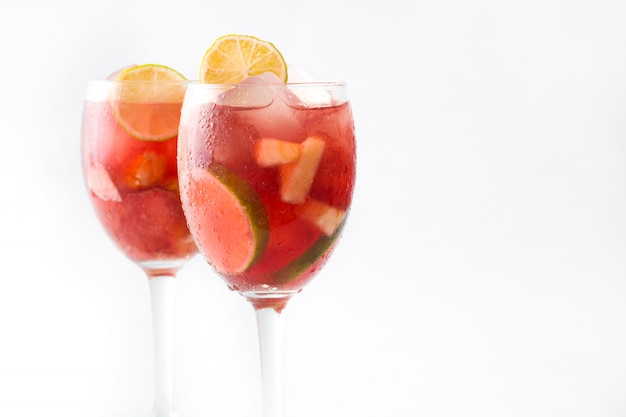 Summer sangria in glass isolated on white background copy space