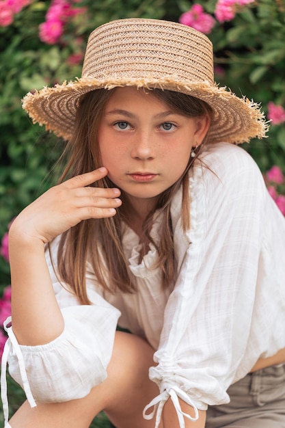 Summer stories of a little girl White Tshirt Straw hat Pink roses