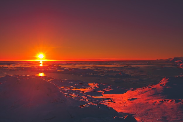 Summer sunset in Antarctica. Beautiful winter background