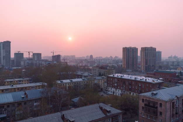 Summer sunset in a smogcovered city