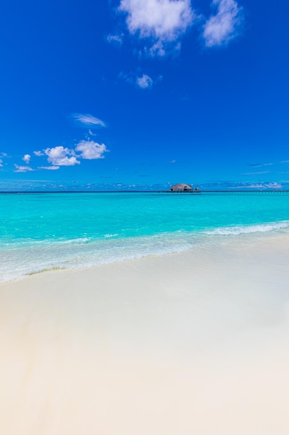 Summer vacation, holiday background of a tropical beach and blue sea and white clouds with relaxing