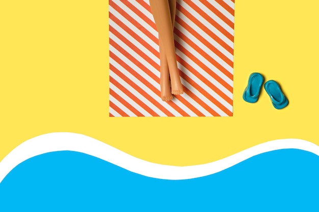 Summer vacation layout with doll legs on beach towels flat pool beach yellow background