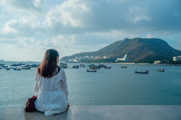 Summer Vacation Smiling Asian women relaxing and standing walking on the beach Vung Tau so happy