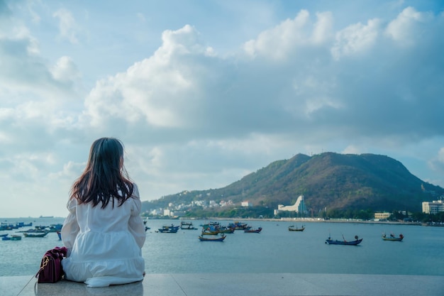 Summer Vacation Smiling Asian women relaxing and standing walking on the beach Vung Tau so happy