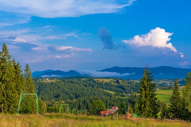 Summer view of hill with elevator for ski tourists