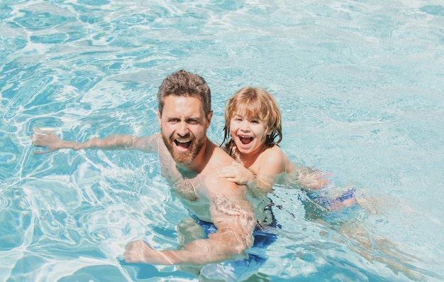 Summer weekend Father and son in swimming pool Pool resort