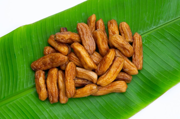 Sun-dried bananas on banana leaf