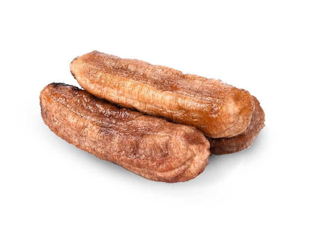 Sun-dried bananas on a white isolated. Dried bananas close-up.