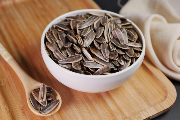 Sun flower seeds in a bowl on table