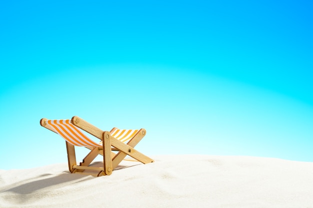 Sun lounger on the sandy beach