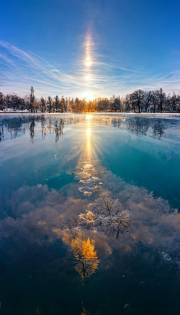 The sun shines brightly over a frozen lake generative ai