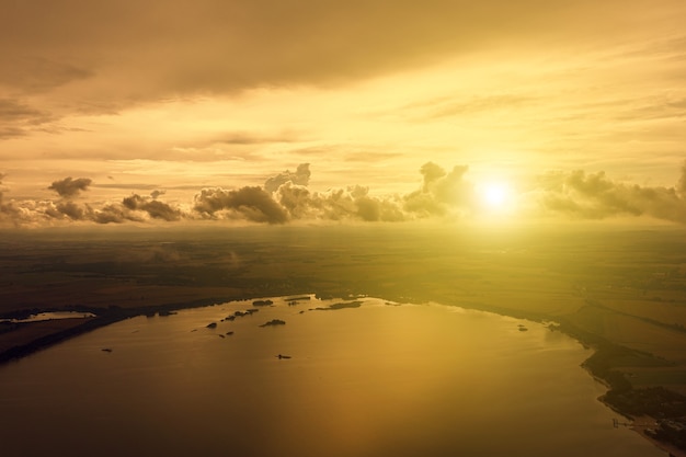 The sun sparkles over the lake in the steppe