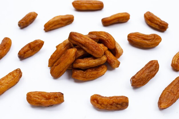 Sundried bananas on white background