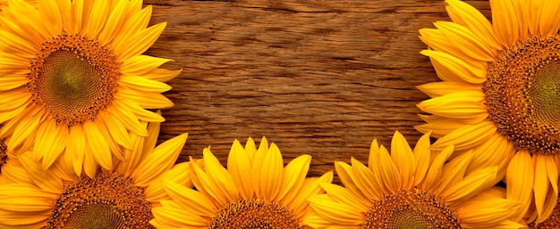 Sunflower flowers on a wooden background Top view