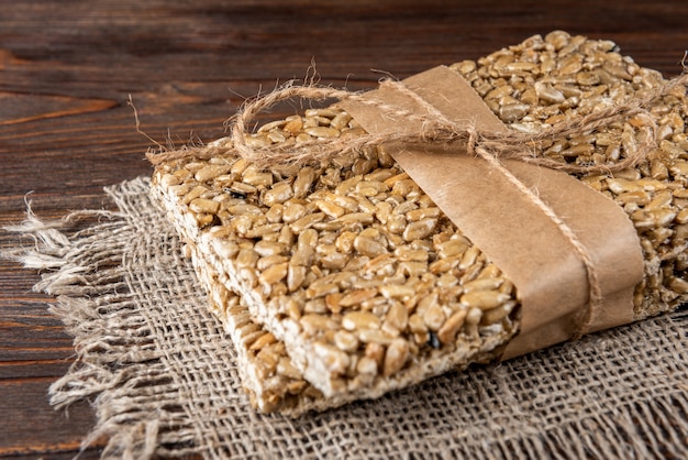 Sunflower seed kozinaki on the wooden table