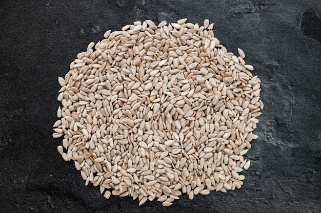 Sunflower seeds isolated on black background