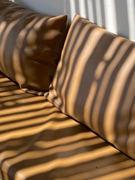 Sunlight on brown chair in summer day