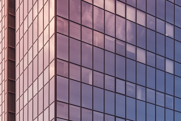 Sunlight reflecting on the glass facade of an office building