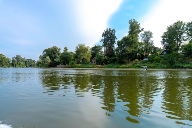 Sunny day on a calm river in summer