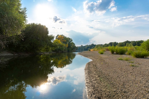 Sunny day on a calm river in summer