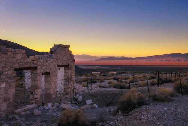 Sunrise above abandoned building in Rhyolite Nevada