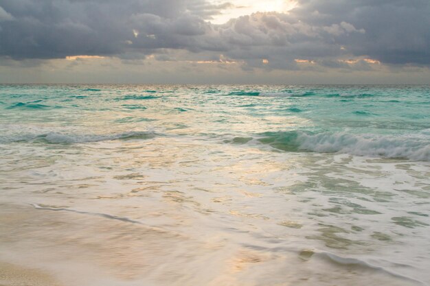 Sunrise over the beach on Caribbean Sea.