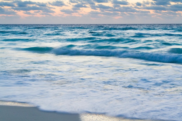 Sunrise over the beach on Caribbean Sea.