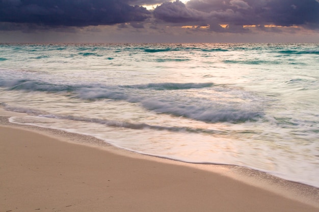 Sunrise over the beach on Caribbean Sea.