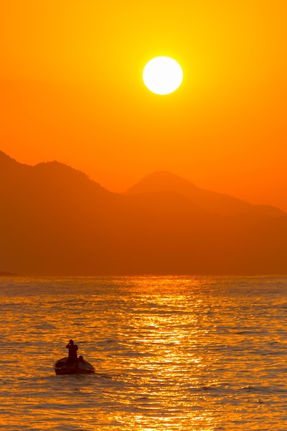 Sunrise on Copacabana beach in Rio de Janeiro Brazil.