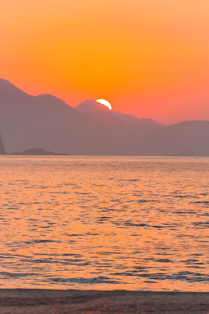 Sunrise on Copacabana Beach in Rio de Janeiro Brazil.