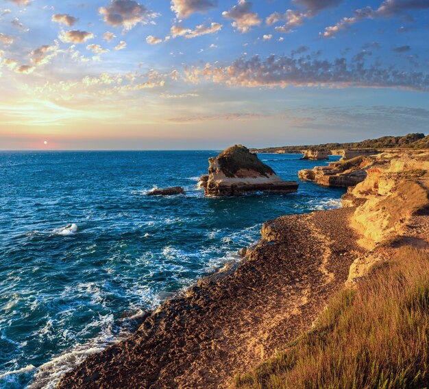 Sunrise Grotta dello Mbruficu Salento sea coast Italy