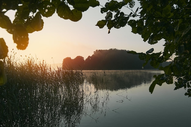 Sunrise on the lake Sunrise over the river Morning Landscape in Kashubian Nation Park Poland