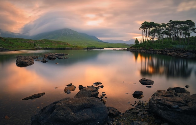 Sunrise landscape scenery of twelve pines island at Derryclare in Connemara National park Ireland